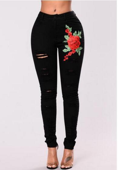 Edgy Elegance: Ladies Embroidery Ripped Black Denim Jeans