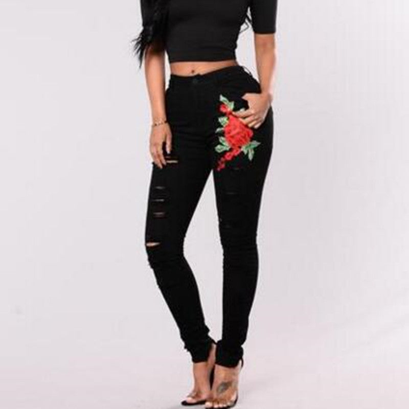 Edgy Elegance: Ladies Embroidery Ripped Black Denim Jeans