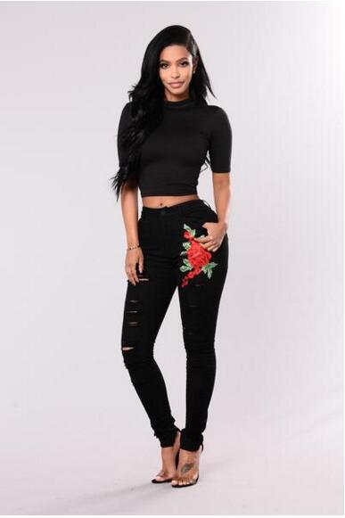 Edgy Elegance: Ladies Embroidery Ripped Black Denim Jeans